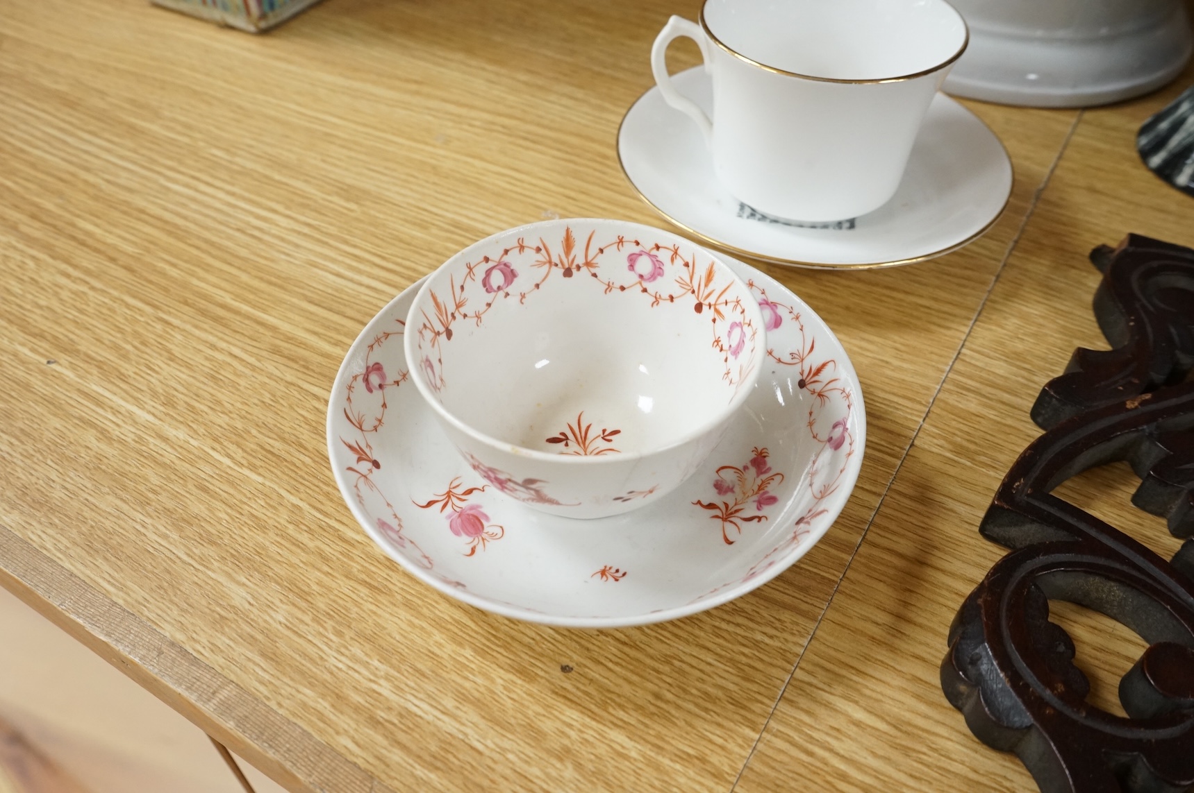 A collection of ceramics and glassware to include a lustre with drops, a bisque figure group and 19th century tea bowl and saucer